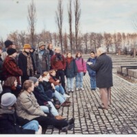 While filming our documentary within the environs of Auschwitz, Romuald gave an impromptu talk about his captivity to a visiting group of American tourists. His audience were transfixed and emotionally upset by his vivid recollections.
