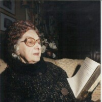 Former pupil and later organ player for the chapel throughout her adult life, Annie Yates reads entries of herself from the school's original diary.
Pictured sat within the now converted chapel, 91 years-young Annie reminisces her childhood memories.