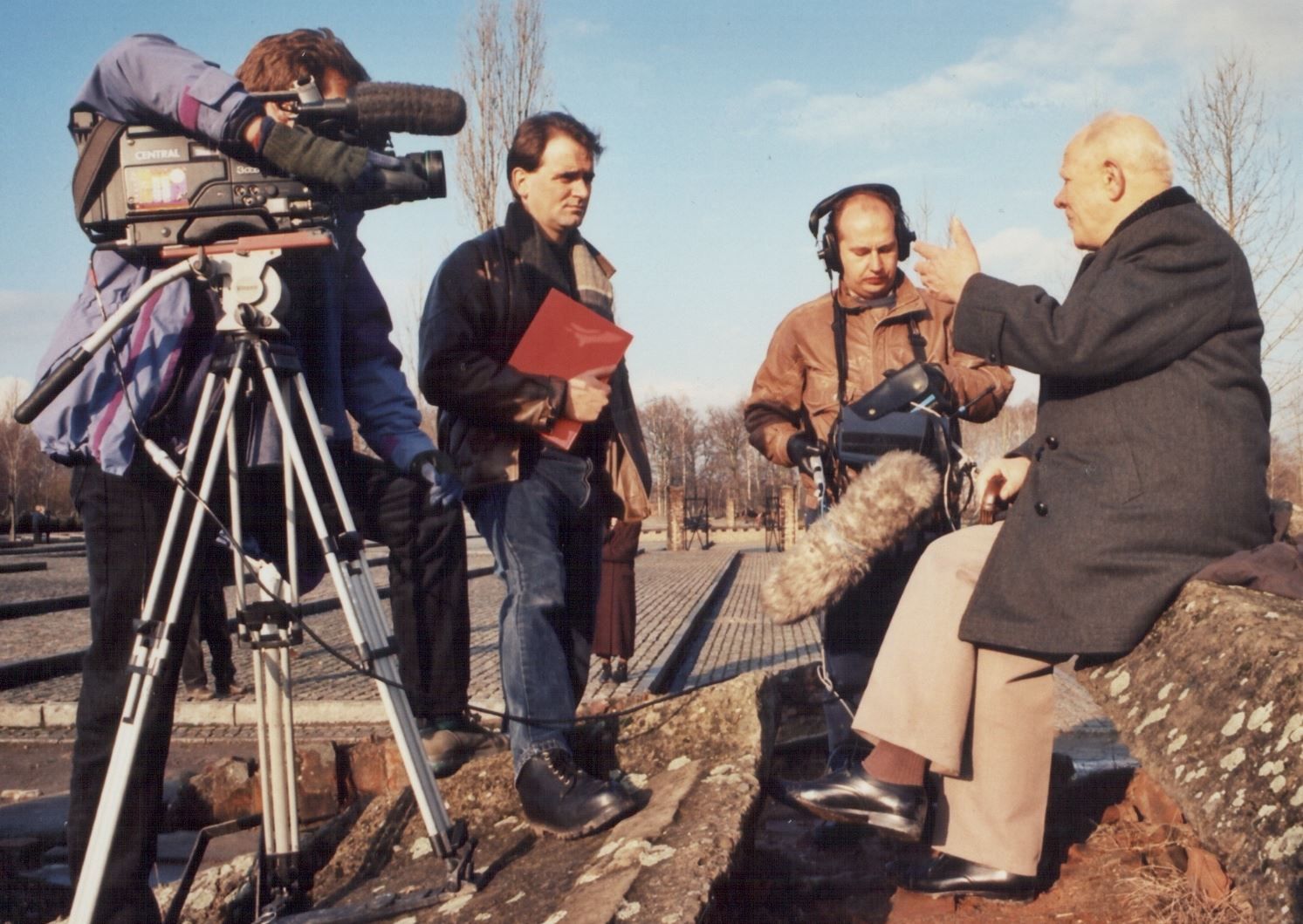 A documentary crew filming an interview