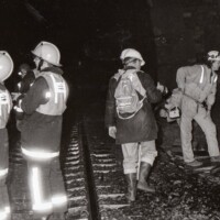 Local Fire crew, tunnel safety officers, and intrepid journalist Malcolm R Fane (2nd right backpacked) commence their two mile 01:30 am walk through a dank Bramhope tunnel, on a very cold February night.